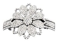 This medium size barrette decorated with tons of SWAROVSKI crystals measures about 3.5 inches wide and 2.5 inch high. The clasp on the back is about 2.25 inches long. P3