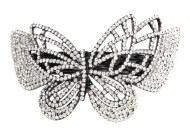 This medium size barrette decorated with tons of SWAROVSKI crystals measures about 3.75 inches wide and 2.25 inch high. The clasp on the back is about 2.25 inches long. P3