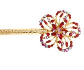 Metal hair stick decorated with a SWAROVSKI CRYSTAL on the of top is about 5.5 inches long totally. The ornamentation on the top is 1.5 inch by 1.5 inch. B1