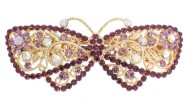 This butterfly shaped barrette with SWAROVSKI crystal measures 3.0 inches by 1.25 inches. The clasp on the back is about 2.0 inches long. P7