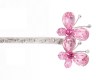 This metal hair stick decorated with a SWAROVSKI CRYSTAL measures approximately 4.75 inches long totally. The ornamentation on the top is 1.75 inch by 1.0 inch. B2