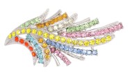 This flower shaped crystal brooch decorated by tons of small rhinestones measures 2.5 by 1 inches