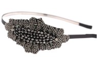 The comfortable headband with a beaded ornamentation. The ornamentation is about 4.25 inches by 2.3 inches. G1