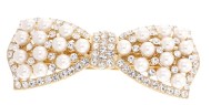 This gorgeous bow barrette is decorated with pearl beads and about 3.0 inches wide by 1.25 inches high. The clasp on the back is about 2.0 inches long. P1
