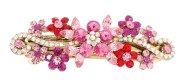 This medium size barrette decroated with tons of crystals measures about 3 inches wide and 1.25 inch high. The clasp on the back is about 2 inches long. P14
