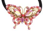 This butterfly ponytail holder with elastic band dresses up your hair with color and style. The butterfly is about 2 inches by 1.5 inches. T1