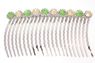 This gorgeous metal hair combs decorated with SWAROVSKI CRYSTAL measures about 4 inches wide 2.25 inches high. The top is about 4 inches by 0.3 inch. Y8