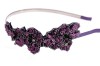 The comfortable headband with a beaded ornamentation. The ornamentation is about 4.5 inches by 1.75 inches. G1