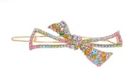 This small flower shaped crystal hair clamp measures 2.5 inches wide and 1.0 inches high. O24