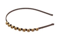 This headband decorated with Swarovski crystals measures approximately 0.25 inch thick at center. G1