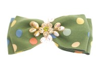 This medium size barrette measures about 4.25 inches wide and 2.0 inch high. The clasp on the back is about 2.5 inches long. P18