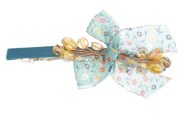 This medium size barrette measures about 3.25 inches wide and 2.0 inch high. The clasp on the back is about 2.0 inches long. P18