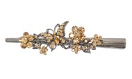 This clamp is adorned with crystals. It measures approximately 4.75 inches long. H11