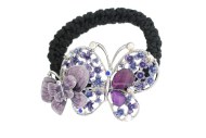 This butterfly ponytail holder is made with rhinestones and about 2.5 inches by 1.75 inches. T6