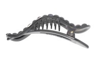 This medium size plastic hair claw (jaw clip) is about 4.5 inches wide and 0.8 inches high. H5