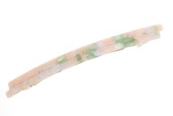 This plastic barrette is 4.5 inches wide and 1.25 inches high. The clasp on the back is about 3.0 inches long. P17