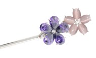Metal hair stick decorated with a SWAROVSKI CRYSTAL on the of top is about 6.25 inches long totally. The ornamentation on the top is 1.5 inch by 0.75 inch. B1