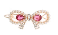 This small crystal hair clamp measures 2.0 inches wide and 0.75 inch high. O23