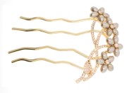 This bridal (wedding) hair comb with SWAROVSKI crystal measures approximately 4.0 inches long. The top is about 3.0 inches by 1.5 inches. Y5
