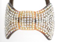 This ponytail holder is made with SWAROVSKI CRYSTAL and about 2.25 inches by 1.75 inches. T22