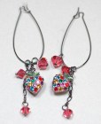 This set of earrings with SWAROVSKI crystal are about 3.25 inches high.