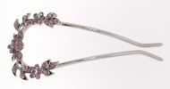 This hair stick decorated with crystal measures approximately 4.25 inches long. B5