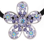 This fabulous ponytail holder is made with crystals. The flower is about 1.5 inches by 1.5 inches. T5