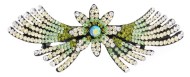 This gorgeous medium size barrette decorated with SWAROVSKI crystals measures about 3.25 inches wide 1.25 inch high. The clasp on the back is about 1.75 inches long. P16