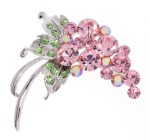 This medium fruit shaped SWAROVSKI CRYSTAL brooch measures approximately 2 inches wide and 2 inches high.